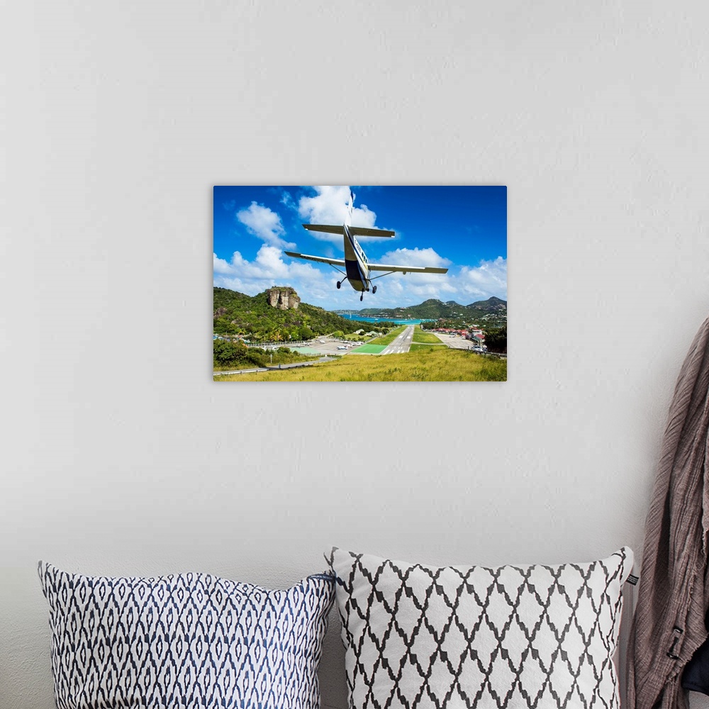 A bohemian room featuring Small airplane landing at the airport of St. Barth, Lesser Antilles, West Indies, Caribbean
