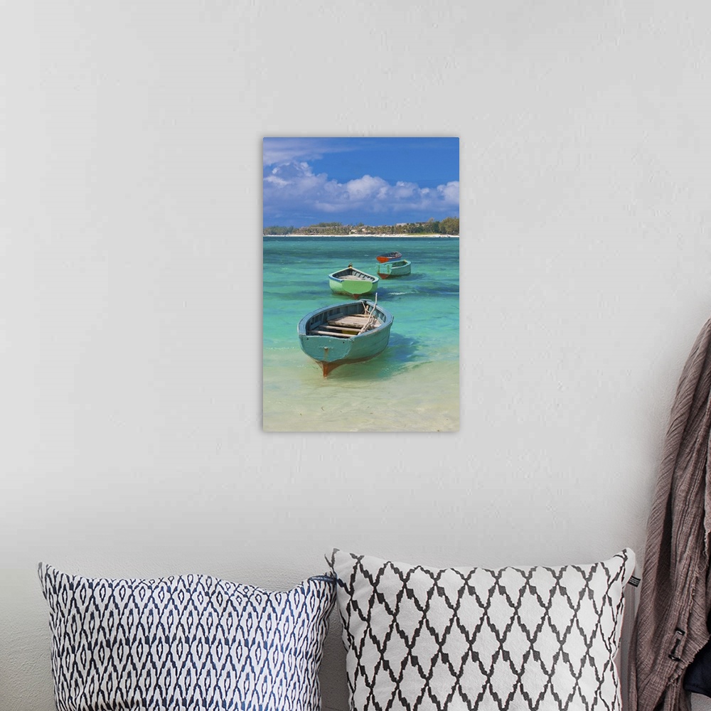 A bohemian room featuring Small fishing boats in the turquoise sea, Mauritius, Indian Ocean, Africa