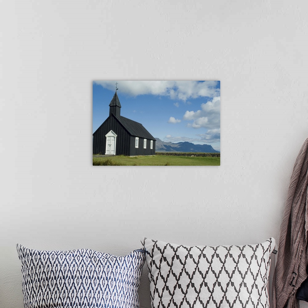 A bohemian room featuring Small local church, Budir, Iceland