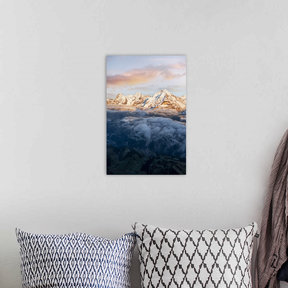A bohemian room featuring Aerial view of snowcapped peaks of Eiger, Monch and Jungfrau in fog at sunset, Murren Birg, Jungf...
