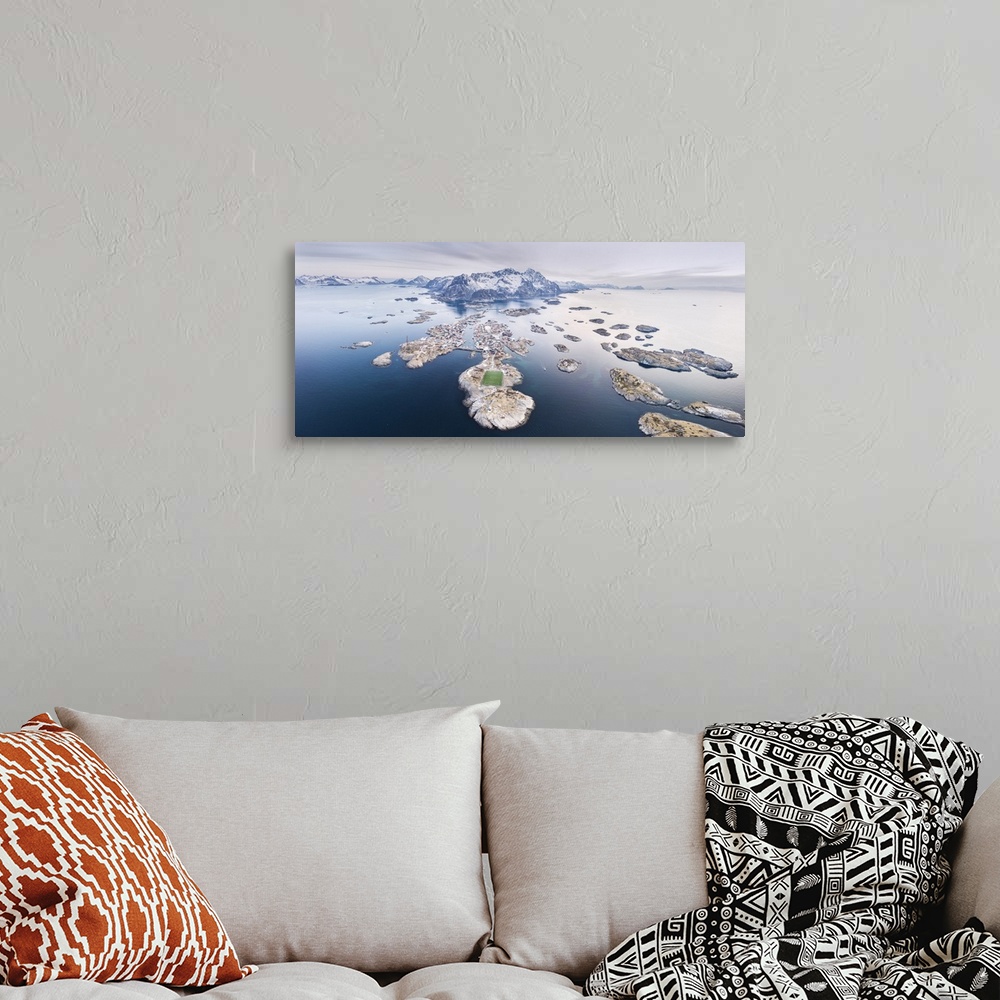 A bohemian room featuring Panoramic aerial view of soccer pitch and islets, Henningsvaer, Vagan municipality, Lofoten Islan...