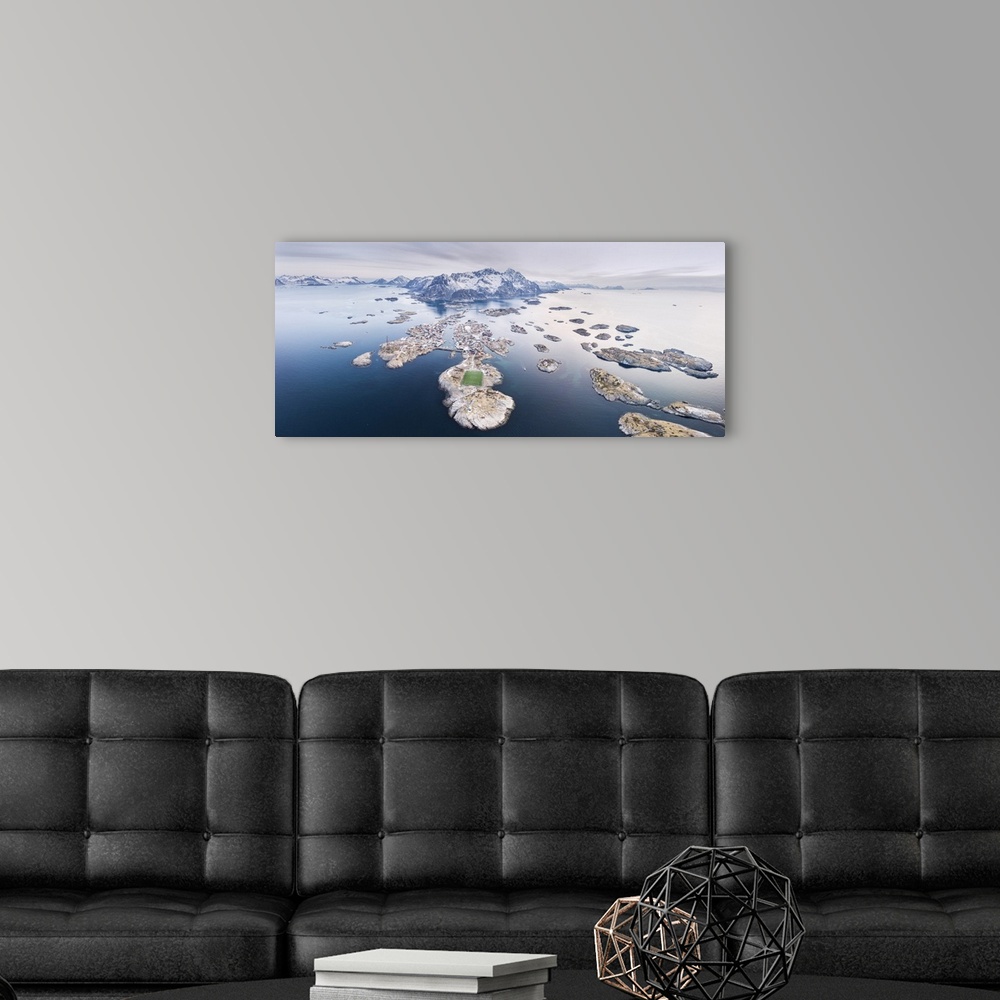 A modern room featuring Panoramic aerial view of soccer pitch and islets, Henningsvaer, Vagan municipality, Lofoten Islan...
