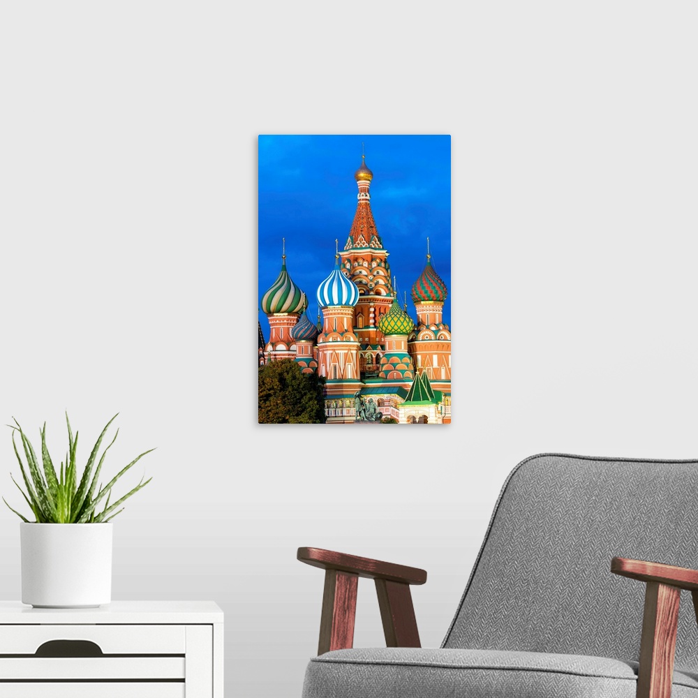 A modern room featuring St. Basil's Cathedral lit up at night, Moscow, Russia