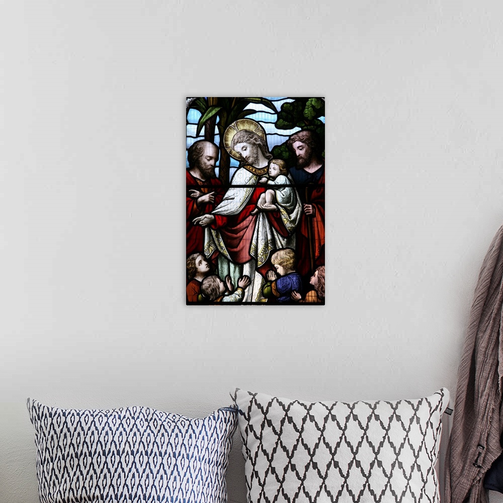 A bohemian room featuring Stained glass window depicting Jesus welcoming children, Sussex, England, UK