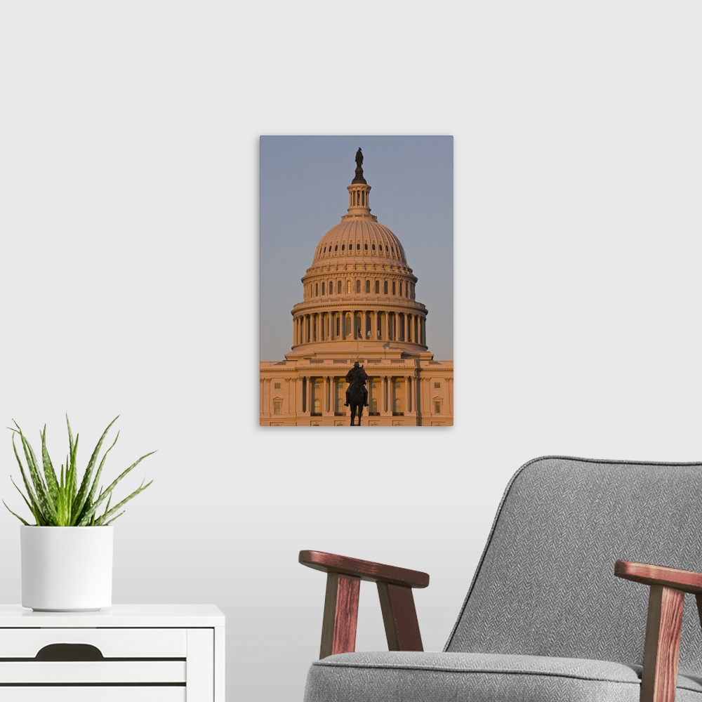 A modern room featuring Statue in front of the dome of the U.S. Capitol Building, evening light, Washington D.C