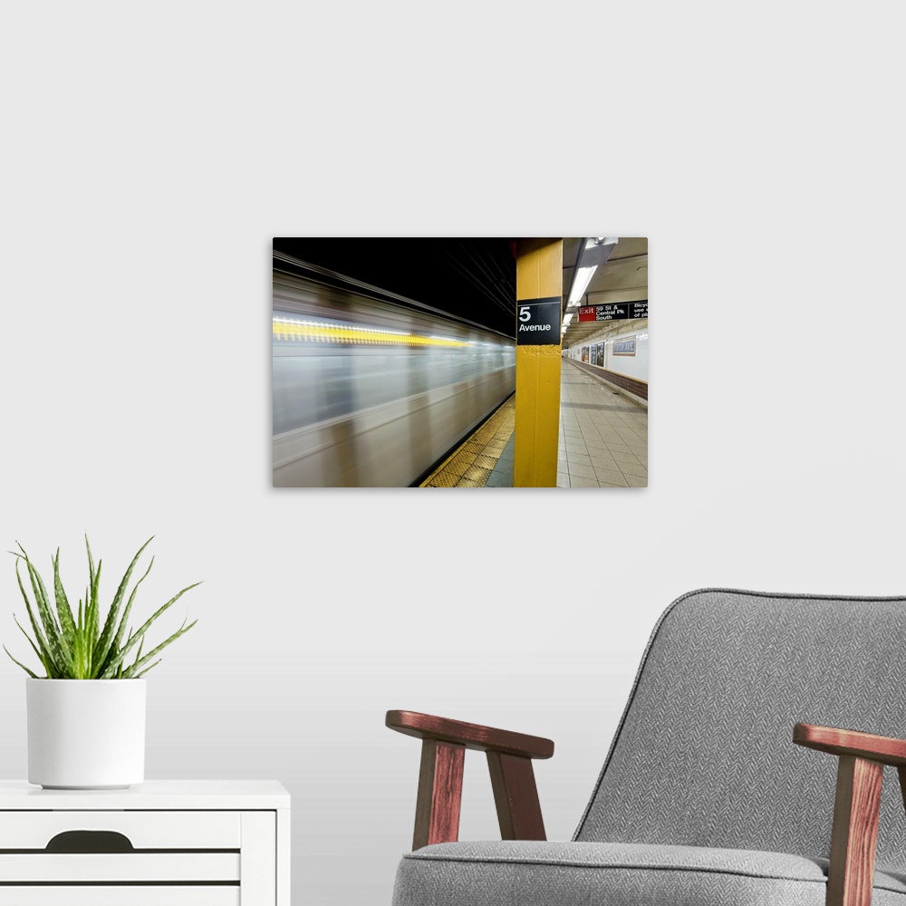 A modern room featuring Subway station and train in motion, Manhattan, New York City, New York, United States of America,...