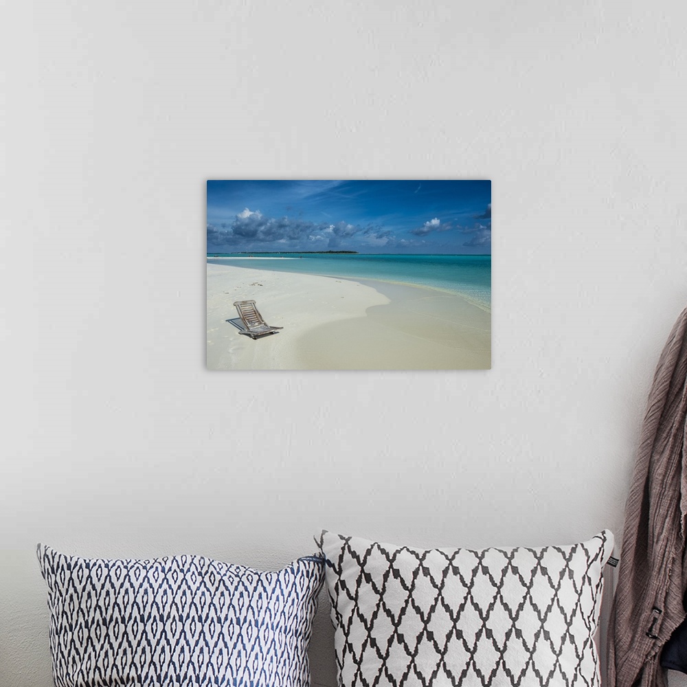 A bohemian room featuring Sun chair on a white sand beach and turquoise water, Sun Island Resort, Nalaguraidhoo island, Ari...
