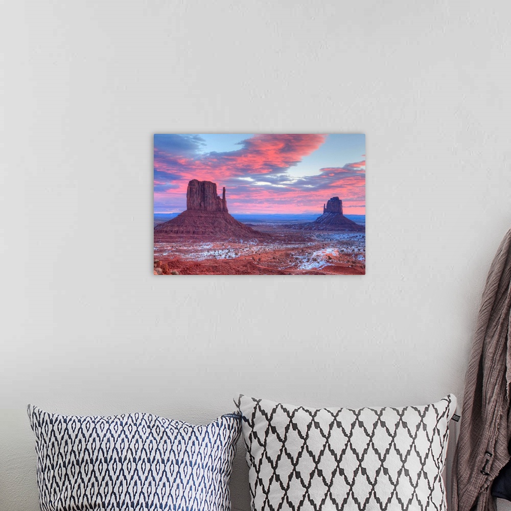 A bohemian room featuring Sunrise, West Mitten Butte on left and East Mitten Butte on right, Monument Valley Navajo Tribal ...