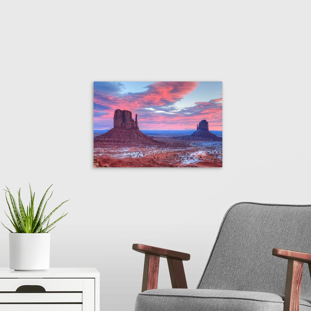 A modern room featuring Sunrise, West Mitten Butte on left and East Mitten Butte on right, Monument Valley Navajo Tribal ...