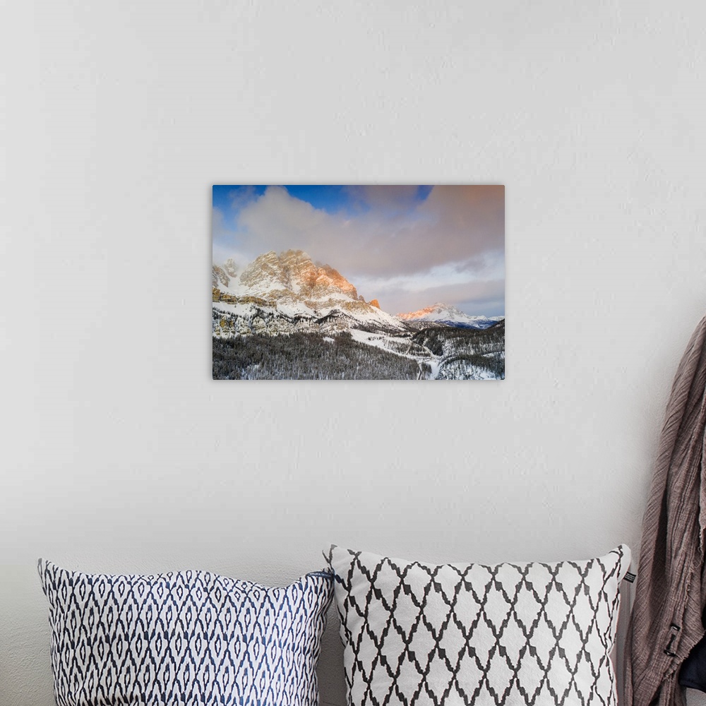 A bohemian room featuring Sunrise over Monte Cristallo and Passo Tre Croci surrounded by snowy woods, Dolomites, Belluno pr...