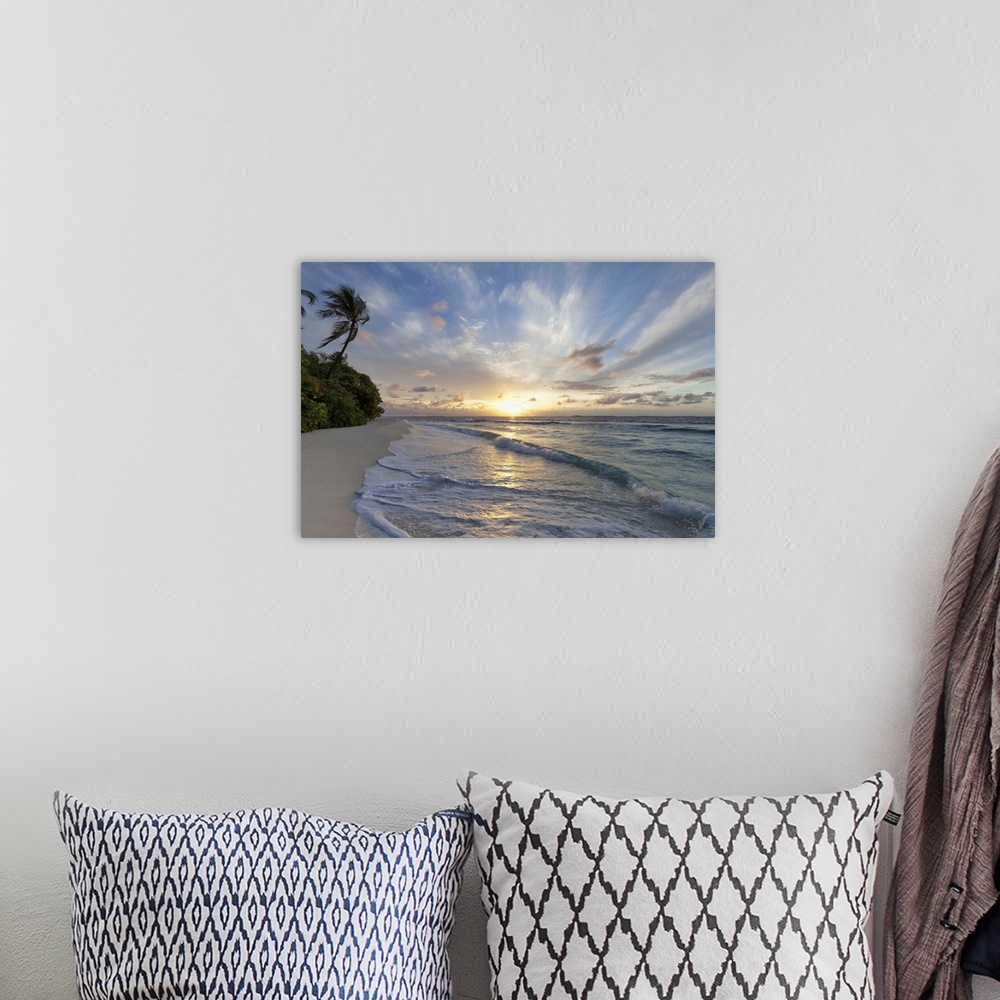 A bohemian room featuring Sunrise over the Indian Ocean from a deserted beach in the Northern Huvadhu Atoll, Maldives, Indi...
