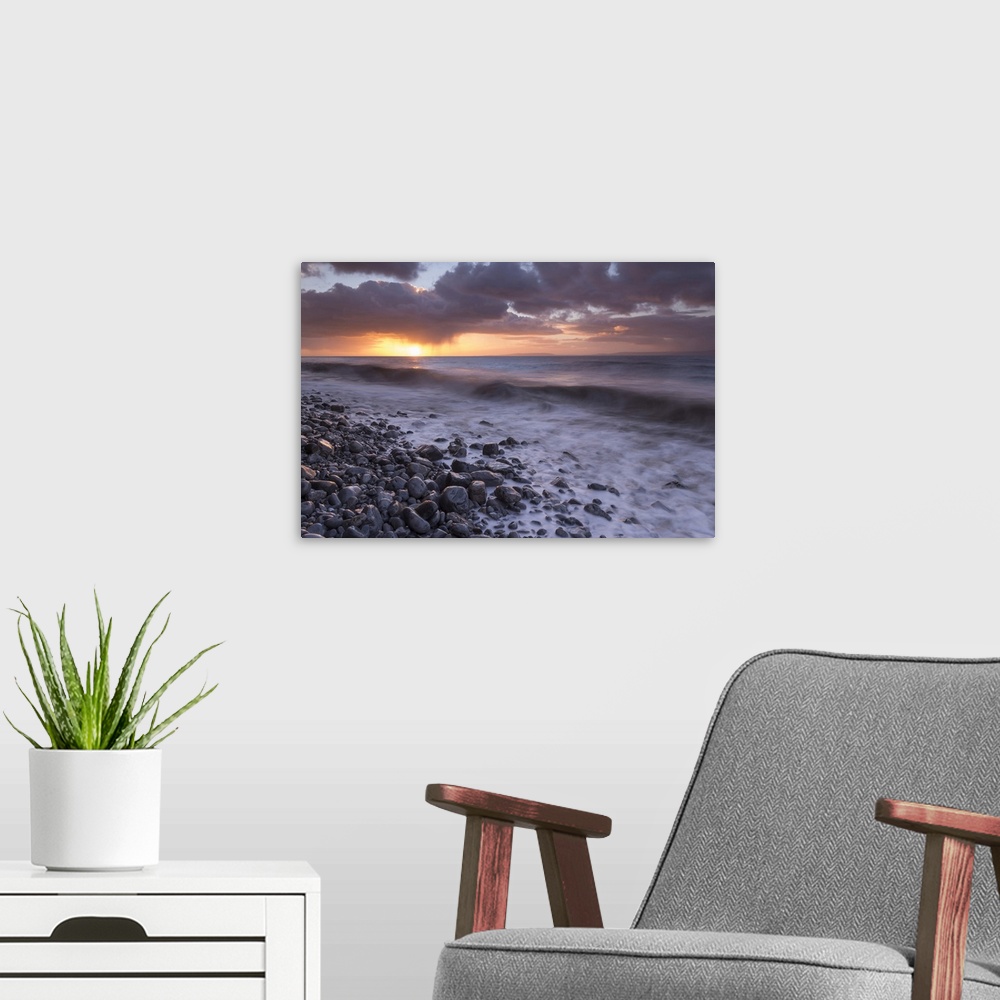 A modern room featuring Sunrise over the sea at Llantwit Major in winter, Glamorgan, Wales, United Kingdom, Europe