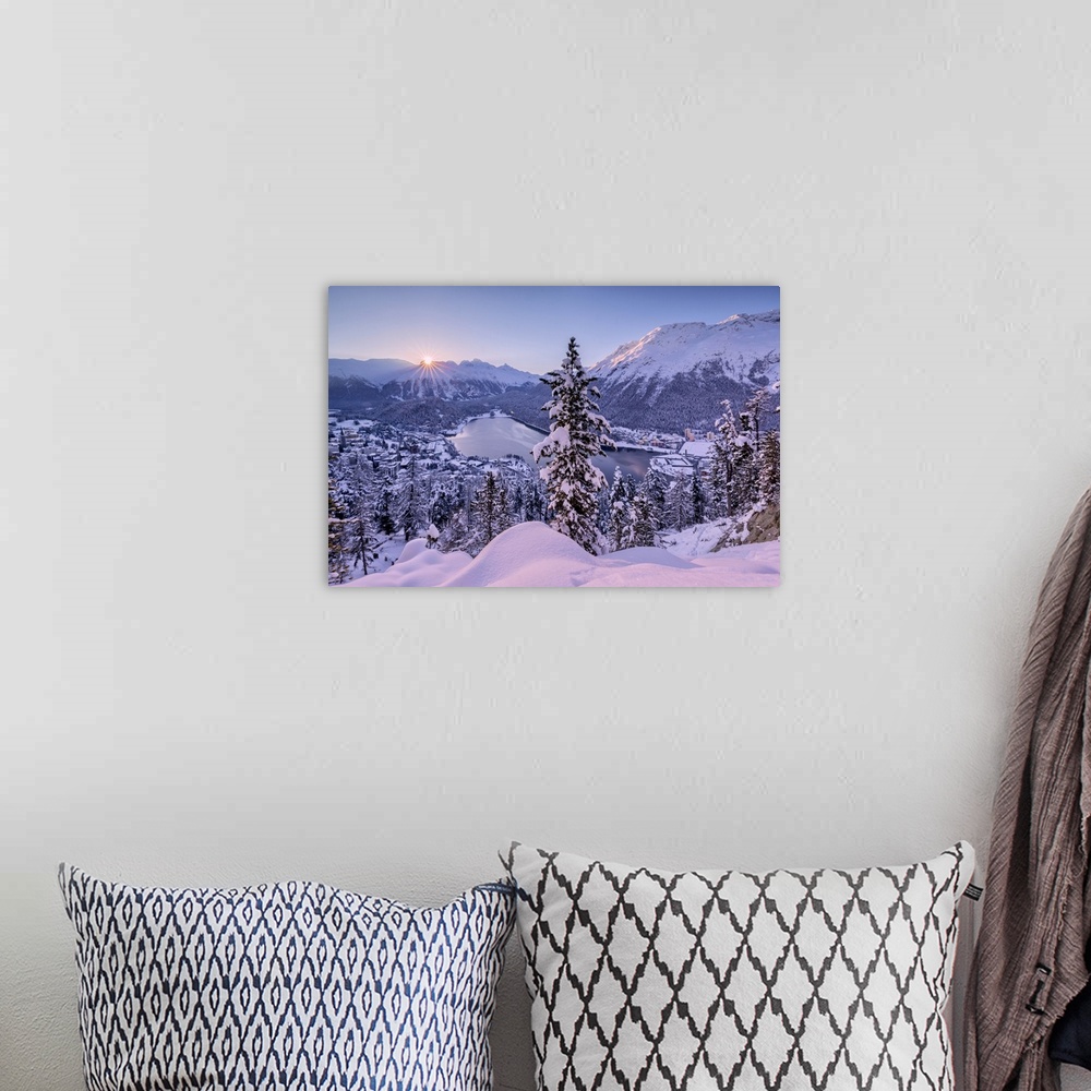 A bohemian room featuring Sunrise over village and Lake of St. Moritz covered with snow, Engadine, Canton of Graubunden, Sw...