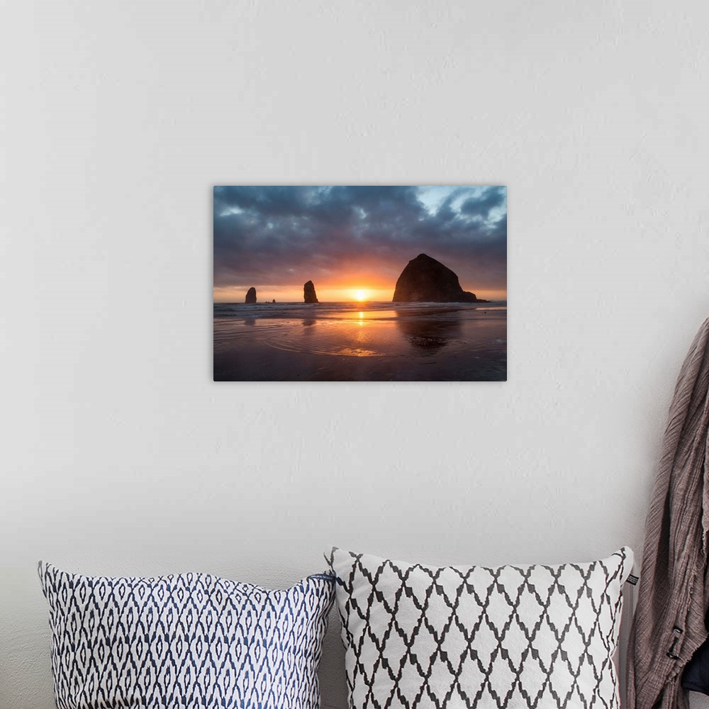 A bohemian room featuring Sunset behind Haystack Rock at Cannon Beach on the Pacific Northwest coast, Oregon
