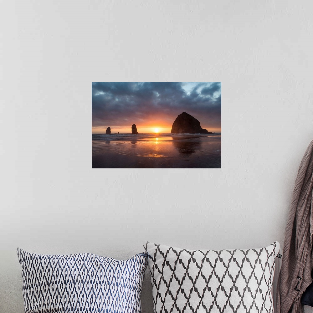A bohemian room featuring Sunset behind Haystack Rock at Cannon Beach on the Pacific Northwest coast, Oregon