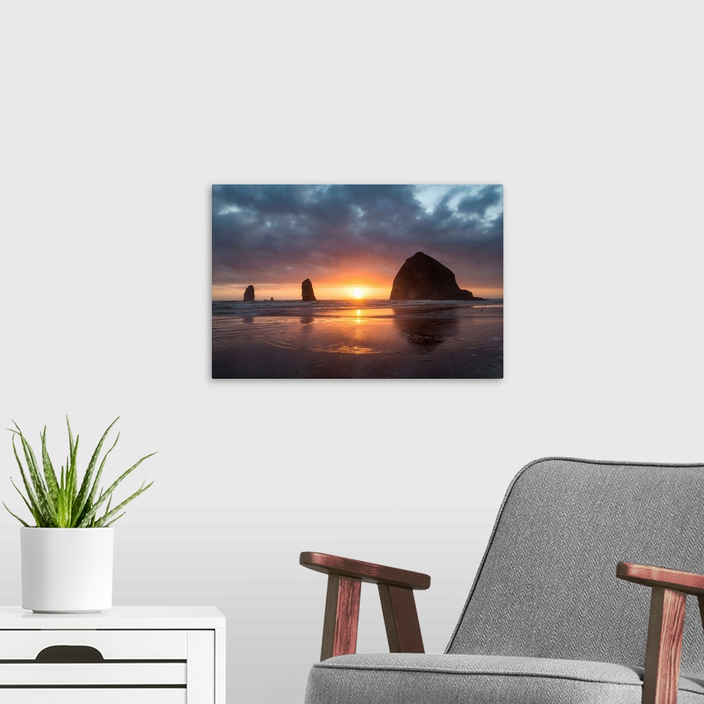 A modern room featuring Sunset behind Haystack Rock at Cannon Beach on the Pacific Northwest coast, Oregon