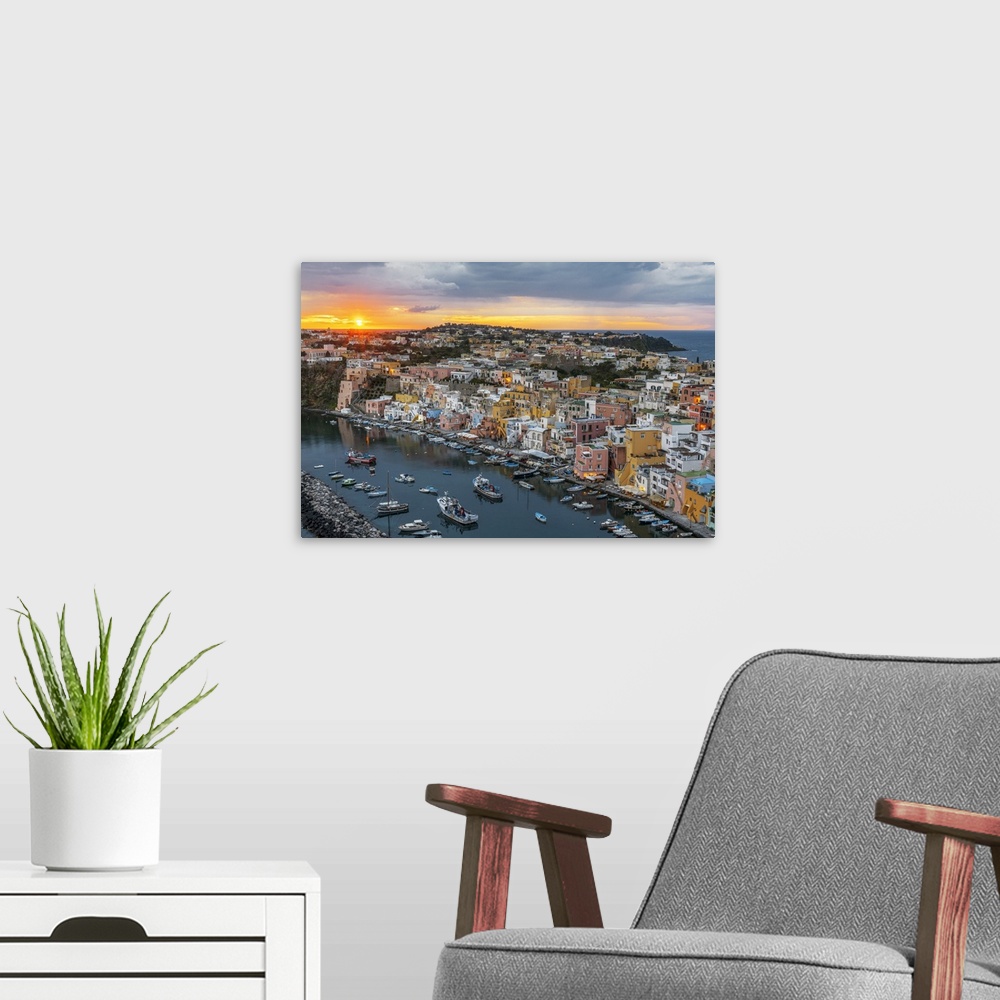 A modern room featuring Sunset on Marina Corricella, the famous colourful fishing village on Procida island, Tyrrhenian S...