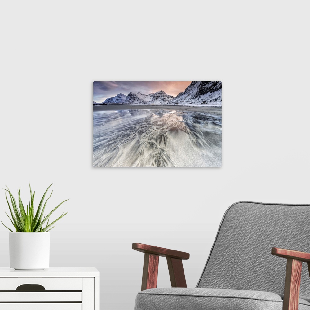 A modern room featuring Sunset on the surreal Skagsanden beach surrounded by snow covered mountains, Flakstad, Lofoten Is...