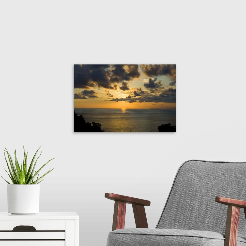 A modern room featuring Sunset over Pacific near Manuel Antonio, Costa Rica
