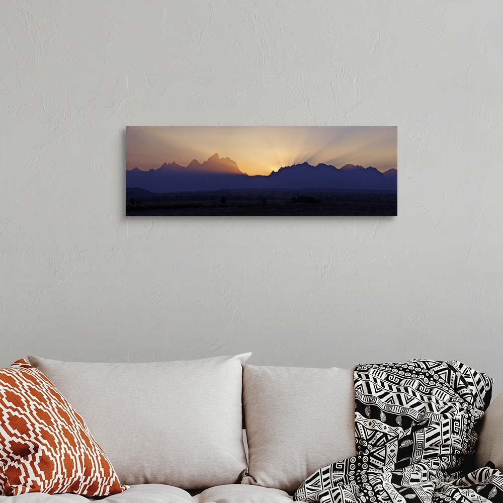 A bohemian room featuring Sunset over the Cathedral Group of mountains, Grand Teton National Park, Wyoming