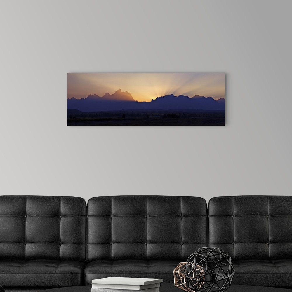 A modern room featuring Sunset over the Cathedral Group of mountains, Grand Teton National Park, Wyoming