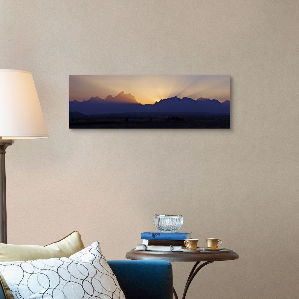 A traditional room featuring Sunset over the Cathedral Group of mountains, Grand Teton National Park, Wyoming