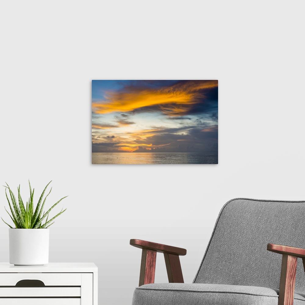 A modern room featuring Sunset over the lagoon of Funafuti, Tuvalu, South Pacific