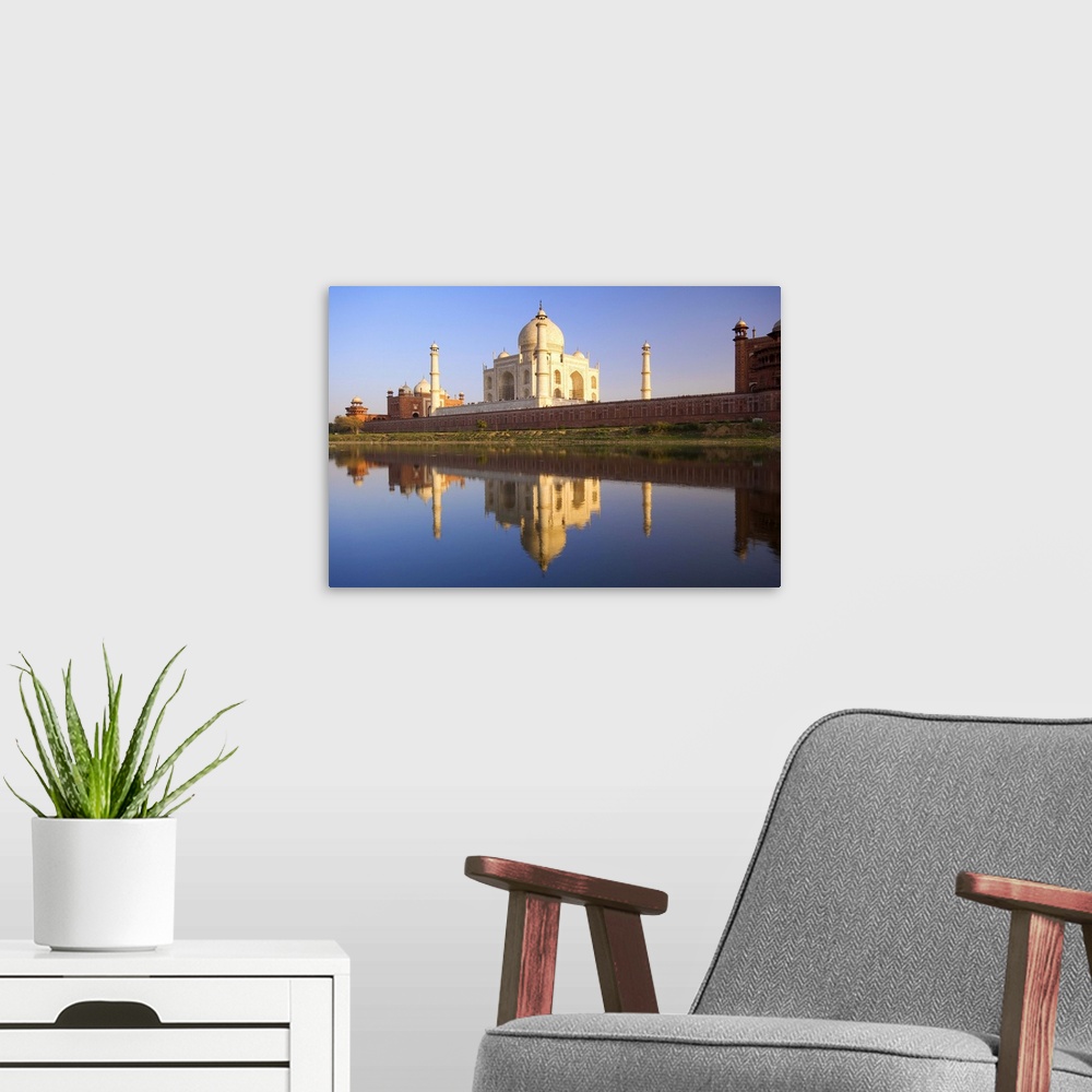 A modern room featuring Taj Mahal, reflected in the Yamuna River, Agra, Uttar Pradesh, India