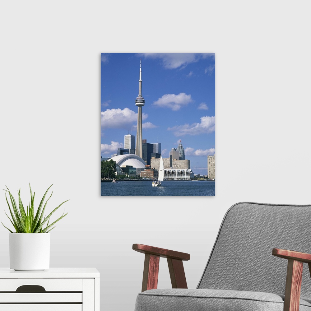 A modern room featuring The C.N.Tower and the Toronto skyline, Ontario, Canada