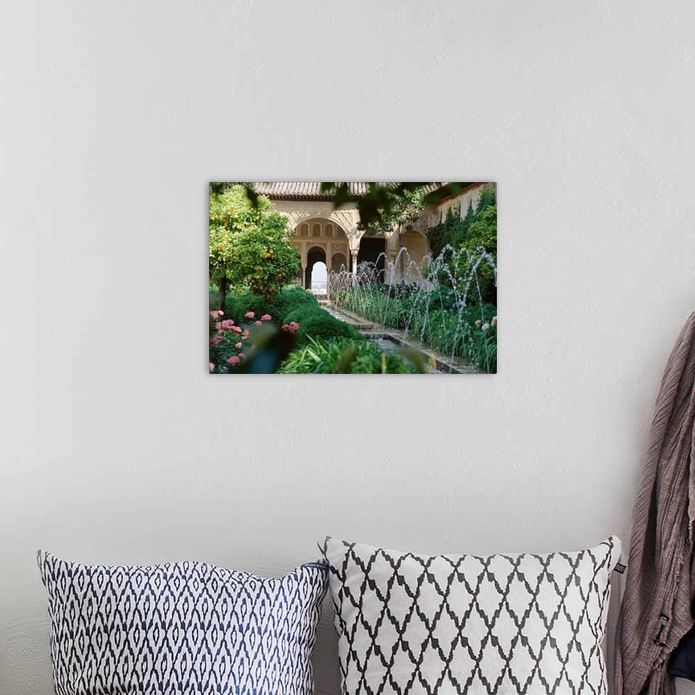 A bohemian room featuring The Canal Court of the Generalife gardens in May, Granada, Andalucia, Spain