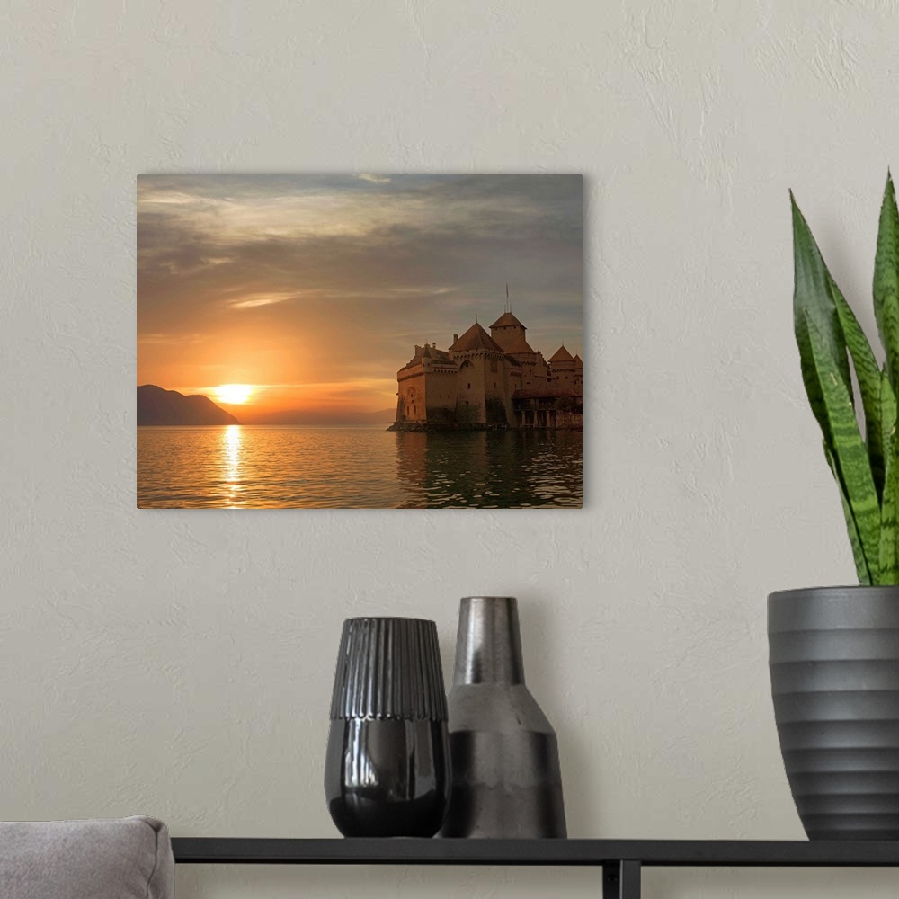 A modern room featuring The Castle of Chillon, on Lake Geneva at sunset, Canton Vaud, Switzerland