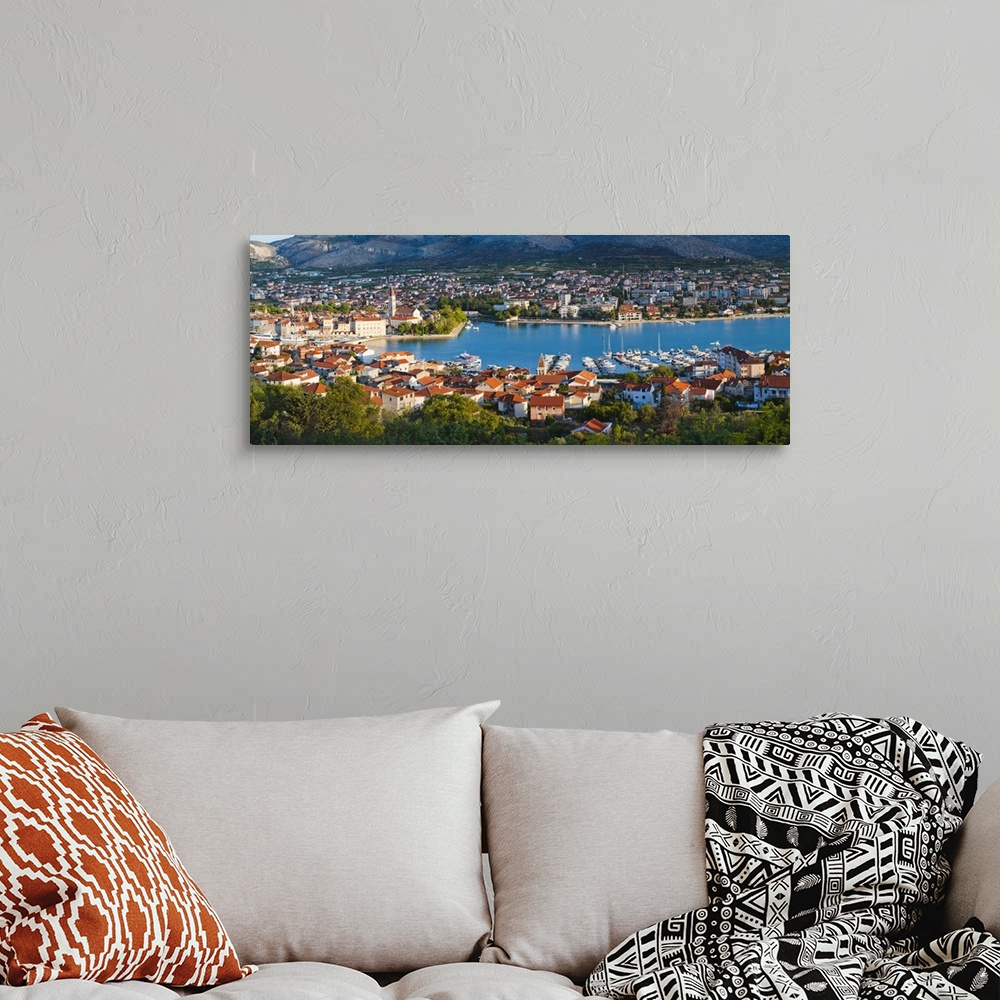 A bohemian room featuring The Cathedral of St. Lawrence and the harbour at sunrise, Trogir, Croatia