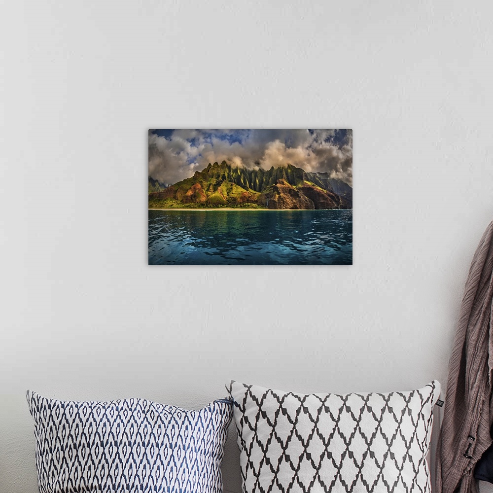 A bohemian room featuring The Cathedral of the NaPali Coastline towers over the calm summer waters at sunset, Hawaii, Unite...
