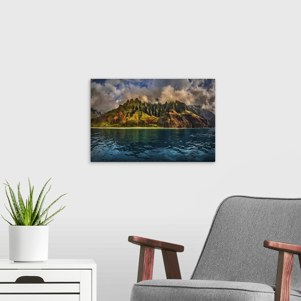 A modern room featuring The Cathedral of the NaPali Coastline towers over the calm summer waters at sunset, Hawaii, Unite...