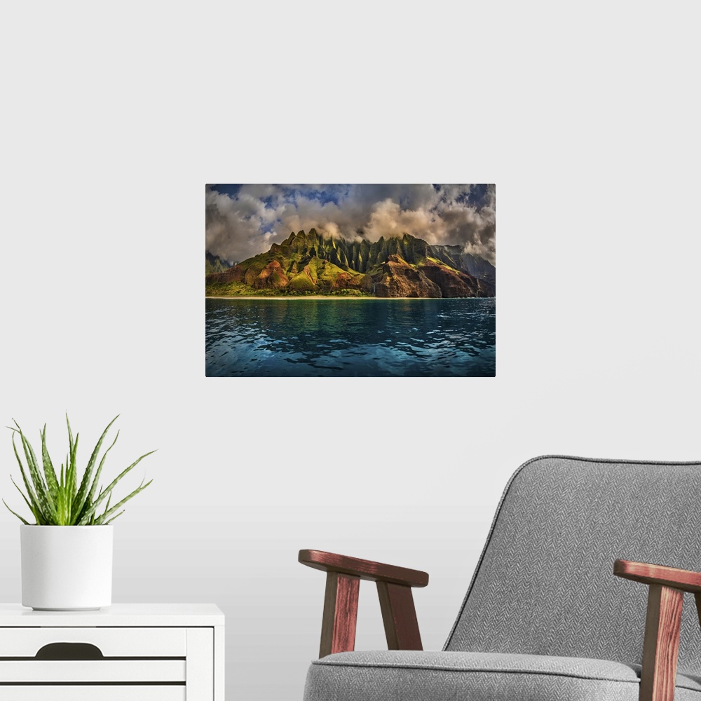 A modern room featuring The Cathedral of the NaPali Coastline towers over the calm summer waters at sunset, Hawaii, Unite...
