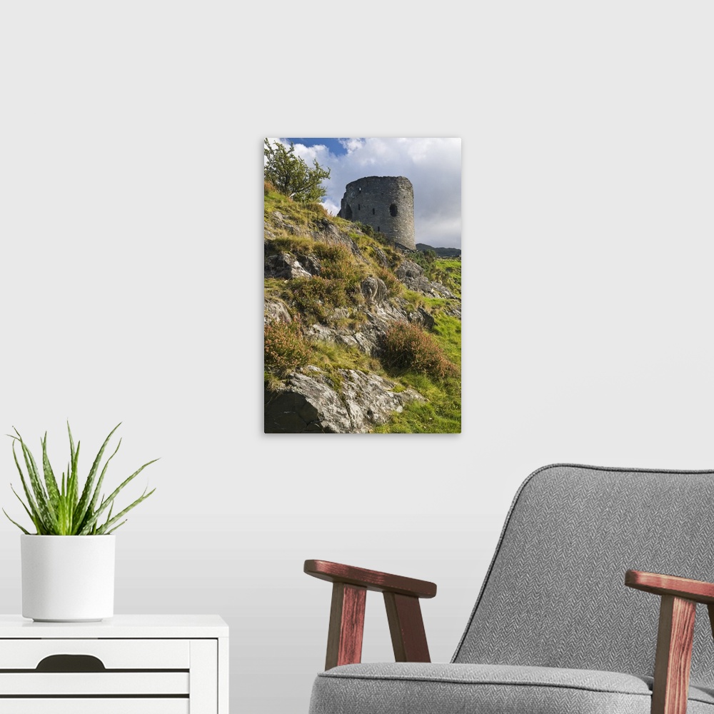 A modern room featuring The derelict keep of Dolbadarn Castle on the banks of Llyn Padarn,  UK
