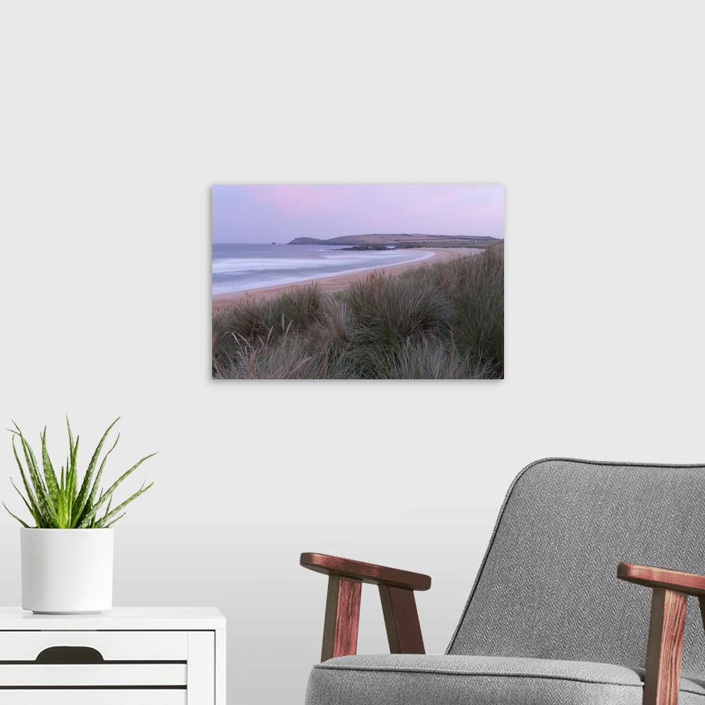 A modern room featuring The dunes and beach at Constantine Bay, Cornwall, England