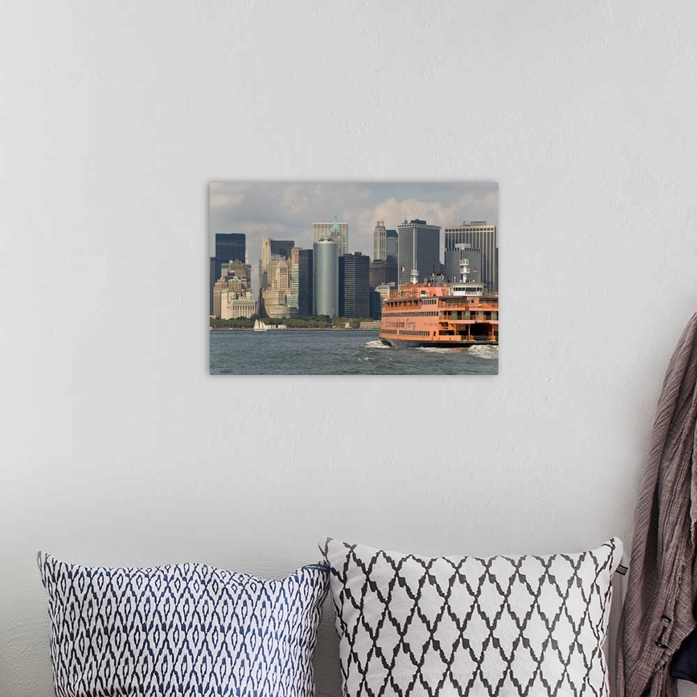 A bohemian room featuring The famous orange Staten Island Ferry approaches lower Manhattan, New York