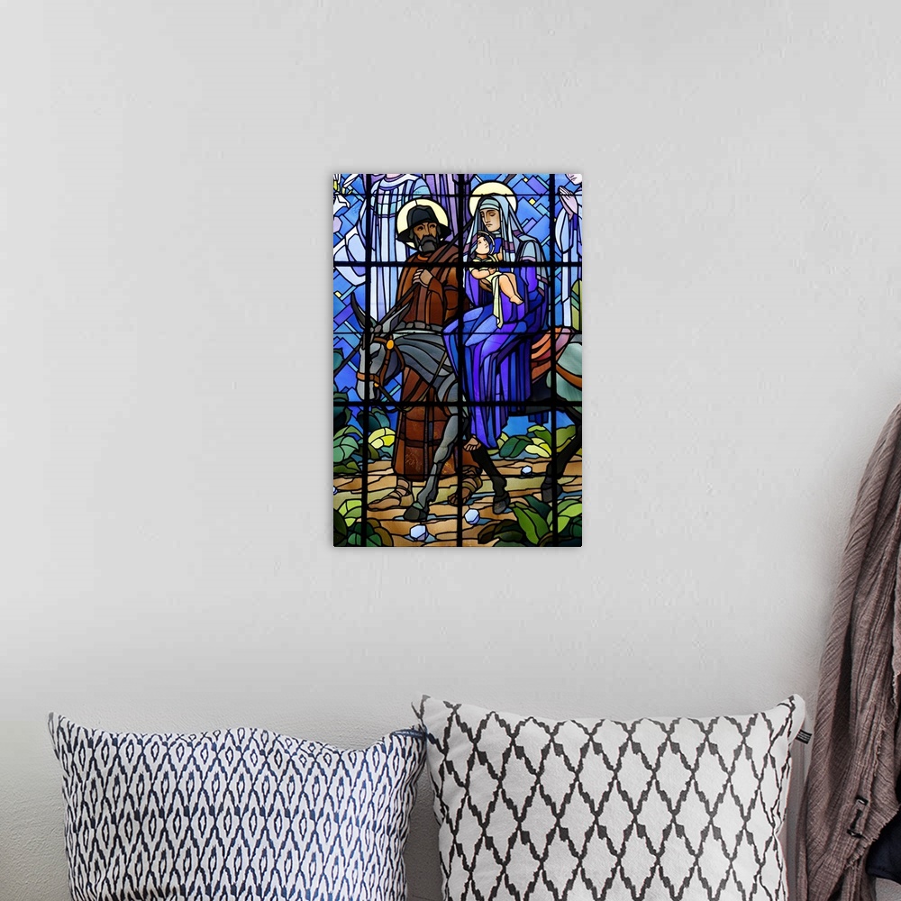 A bohemian room featuring Stained glass window of the Flight into Egypt, in Chedde church, Haute Savoie, France, Europe.