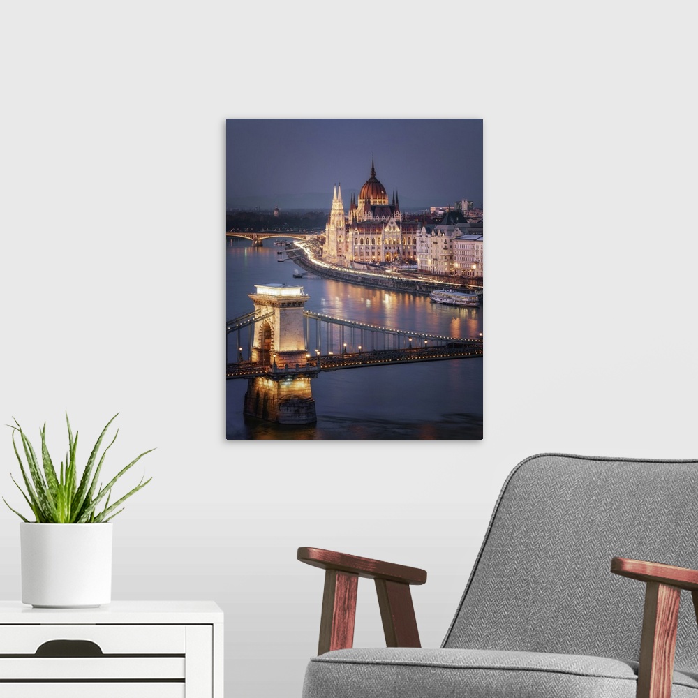 A modern room featuring The Hungarian Parliament on the River Danube with the Chain Bridge, UNESCO World Heritage Site, B...