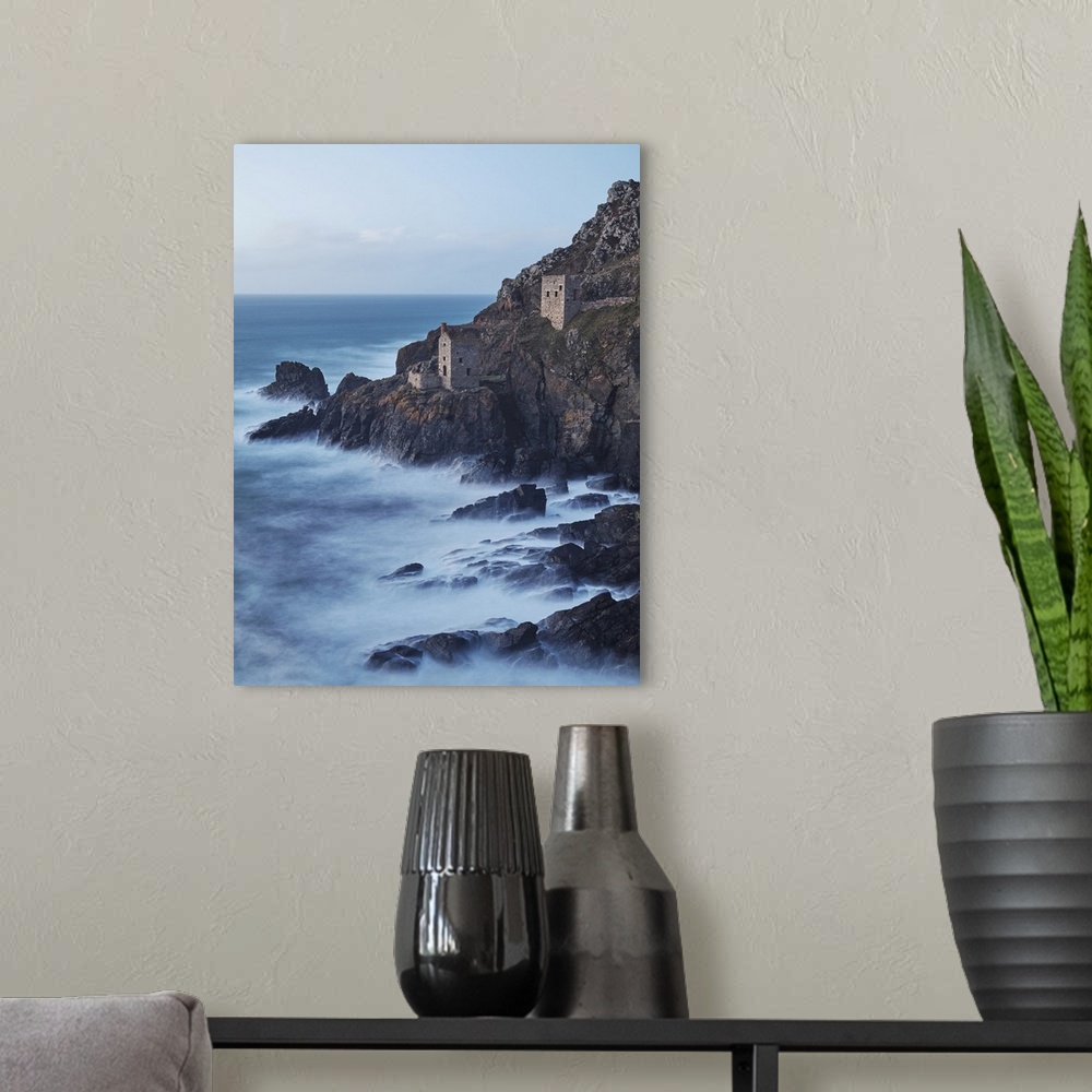A modern room featuring A dusk view of the iconic cliffside ruins of Botallack tin mine, UNESCO World Heritage Site, near...