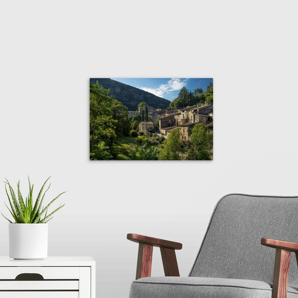 A modern room featuring The medieval mountain village of Saint-Guilhem-le-Desert on the Way of St. James, Herault, Langue...
