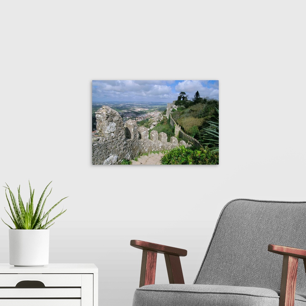 A modern room featuring The ramparts of the Moorish Castelo dos Mouros, captured by Christians in 1147, above the town of...