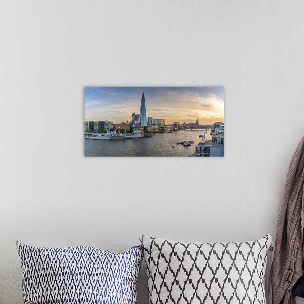 A bohemian room featuring View of The Shard, HMS Belfast and River Thames from Cheval Three Quays at sunset, London, Englan...