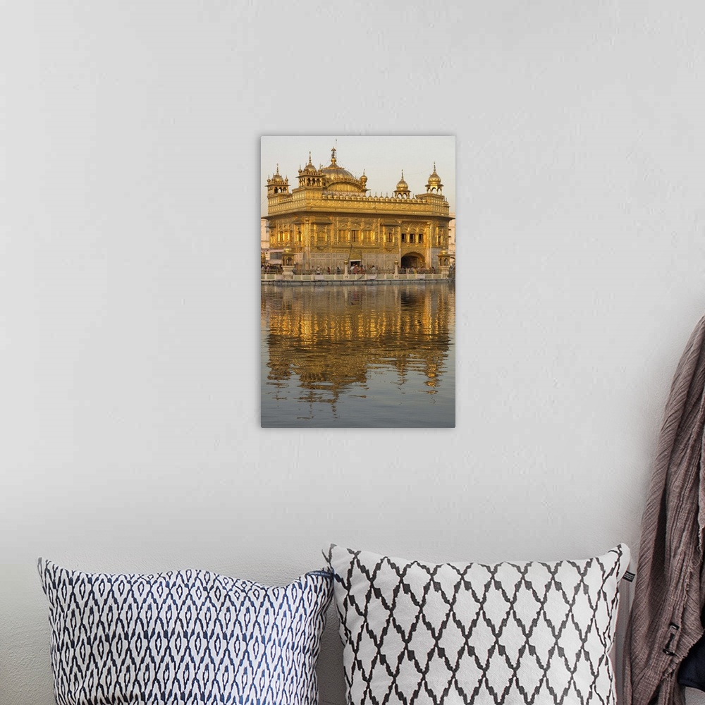 A bohemian room featuring The Sikh Golden Temple reflected in pool, Amritsar, Punjab state, India, Asia