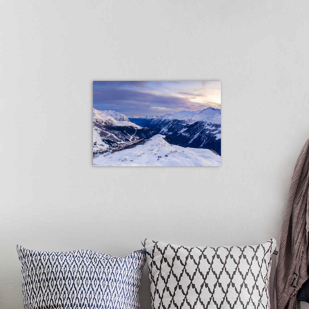 A bohemian room featuring Aerial view by drone of sunset on the snowy peaks surrounding Madesimo and Andossi, Valchiavenna,...