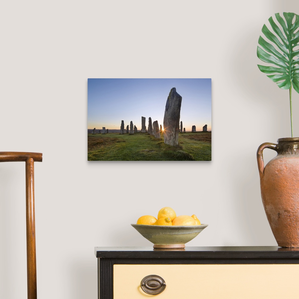 A traditional room featuring The sun rises at Callanish stone circle, Isle of Lewis, Outer Hebrides, Scotland, United Kingdom,...