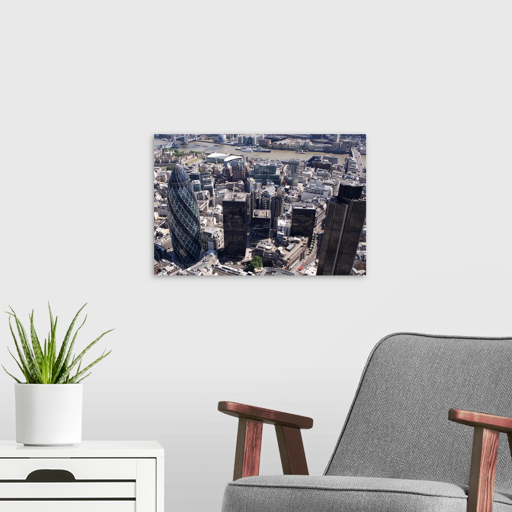 A modern room featuring Tower 42, Gherkin and Lloyds Building, City of London, London, England