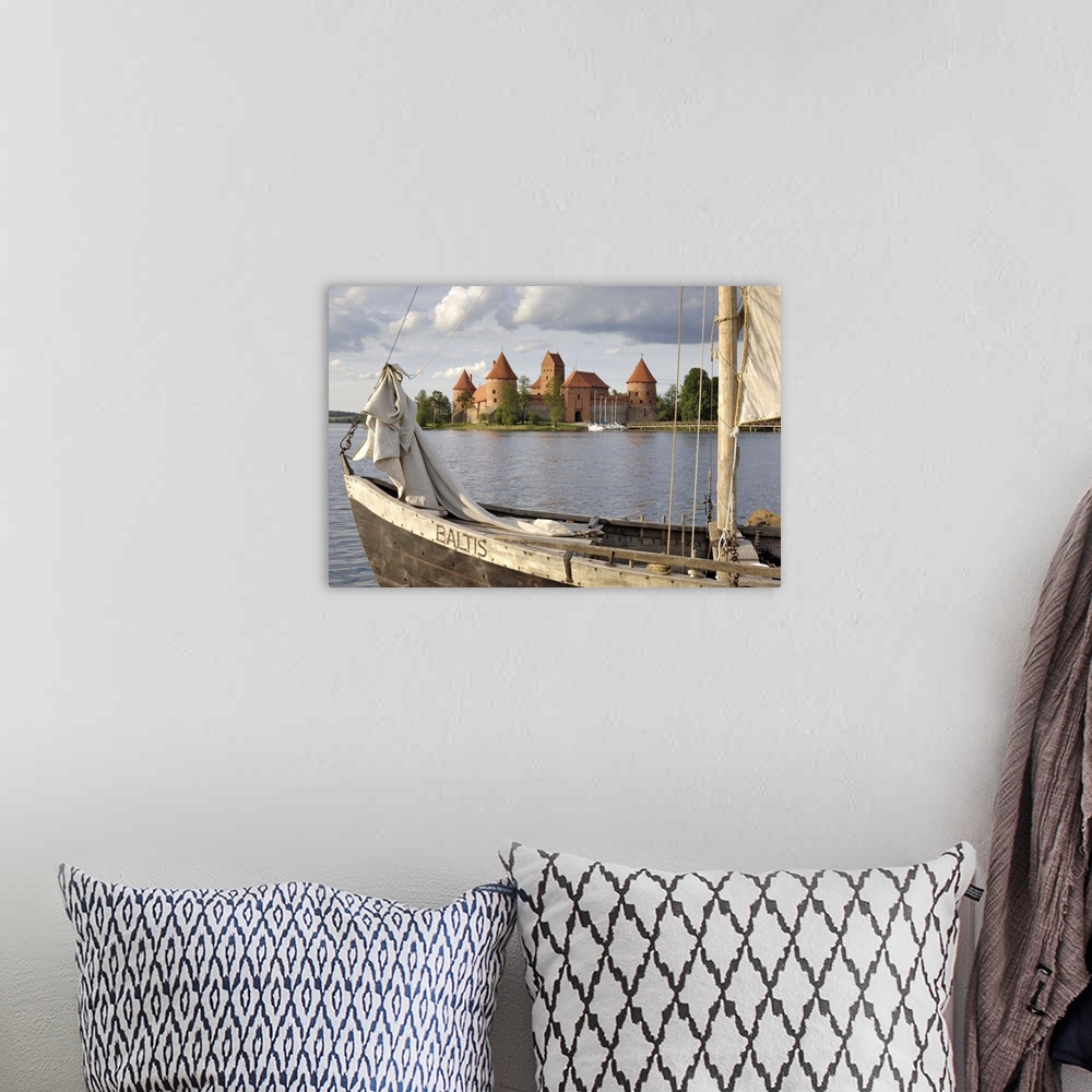 A bohemian room featuring Traditional boat and Trakai Castle, Trakai, near Vilnius, Lithuania, Baltic States