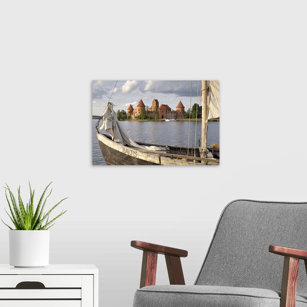 A modern room featuring Traditional boat and Trakai Castle, Trakai, near Vilnius, Lithuania, Baltic States